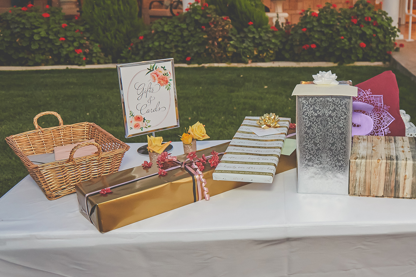 gifts on a table with a sign that says Gifts and Cards